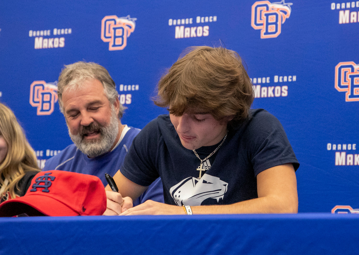 Orange Beach senior Cash Turner was joined by his family in signing his National Letter of Intent to join the South Alabama Jaguars as a preferred walk-on during a National Signing Day ceremony at the high school Wednesday, Feb. 1. Turner was a member of the inaugural Mako football team and said he’s pleased with the legacy he leaves.