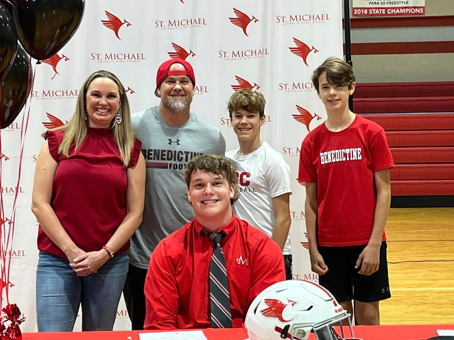St. Michael Catholic senior Tyler Cella was joined by family in signing with the Benedictine Ravens during a Feb. 1 signing ceremony at the high school as part of National Signing Day. Cella was one of two Cardinals who put pen to paper Wednesday as Clay Barr signed with the Delta State Statesmen.