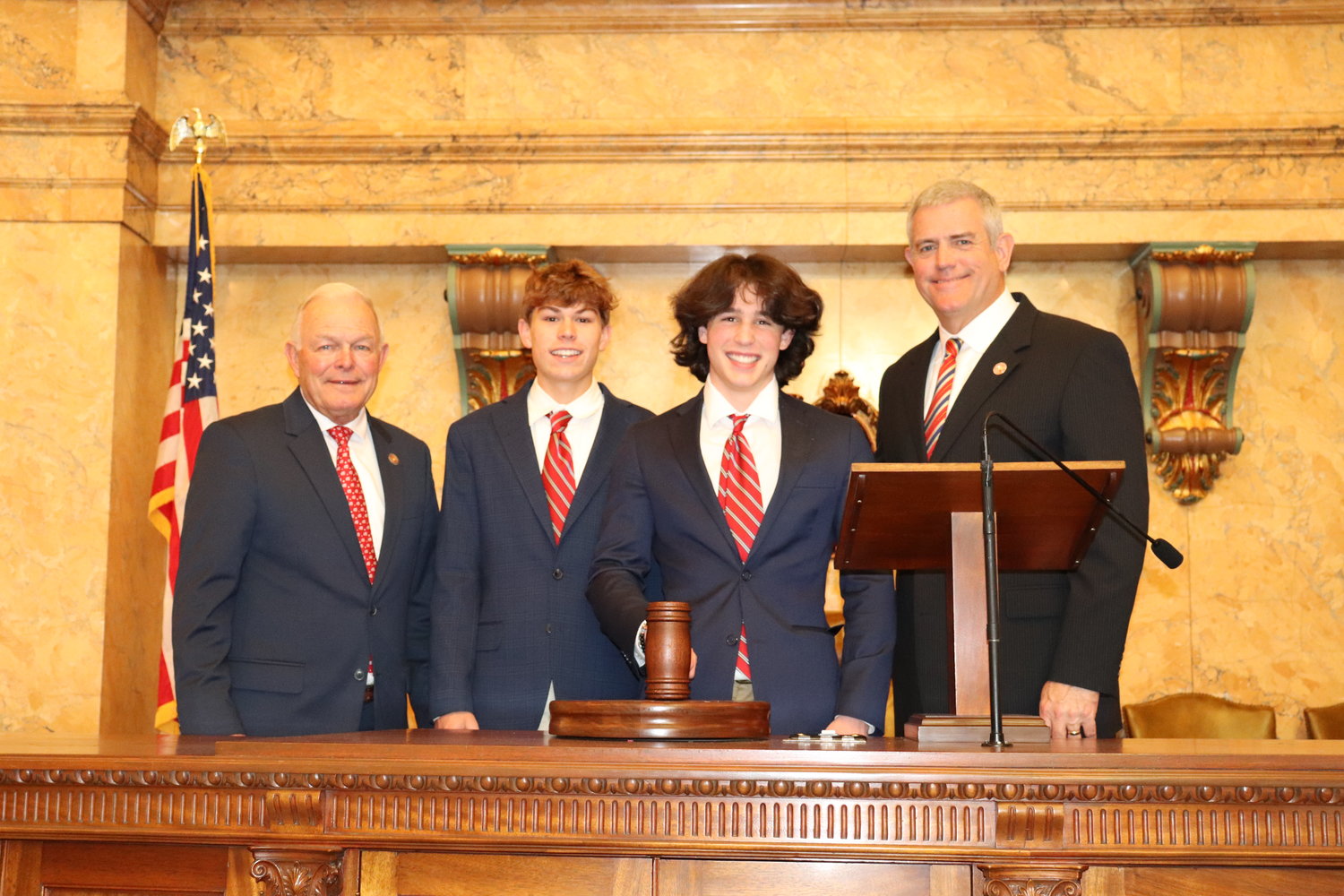(From left) Rep. Manly Barton, Jackson Roberds, Walker Blakeney and Mississippi Speaker of the House Philip Gunn.