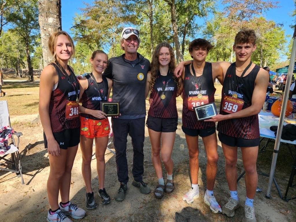 Spanish Fort’s Alexiana Hinote, second from left, and Winston McGhee, second from right, pose with other top finishers including Kate Miller, Ellie Richerson and Jonathan Mason following the Baldwin County Championships Oct. 15, 2022, at Bicentennial Park in Bay Minette. Hinote and McGhee will represent the Toros as two of three local runners at the AHSAA North-South All-Star race this summer.