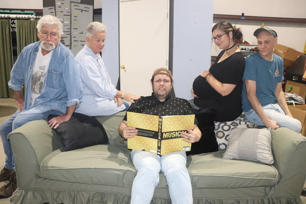 C. Stefan Morrisette, center, wrote and stars in Exit Stage Left's production of "Life is the Working Title: A Play in Progress," which was set to open in Foley this week. It has been postponed until spring. .