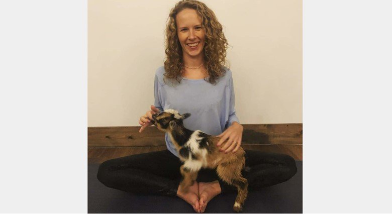 Enjoy a hour of playing with baby goats and doing a little basic yoga in Foley.