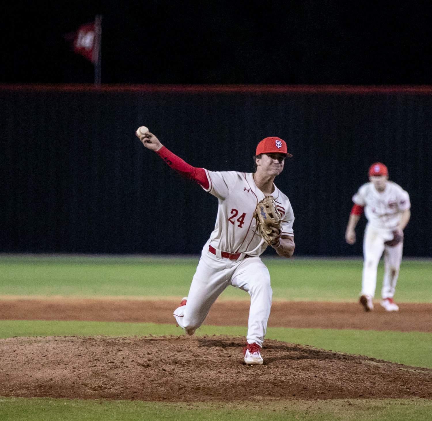 Spanish Fort senior Jack Holley fires a pitch during his relief outing Opening Day at home Thursday, Feb. 16. Holley came up with the go-ahead, two-RBI double in the fifth that helped the Toros take down St. Paul’s by a 7-4 score.