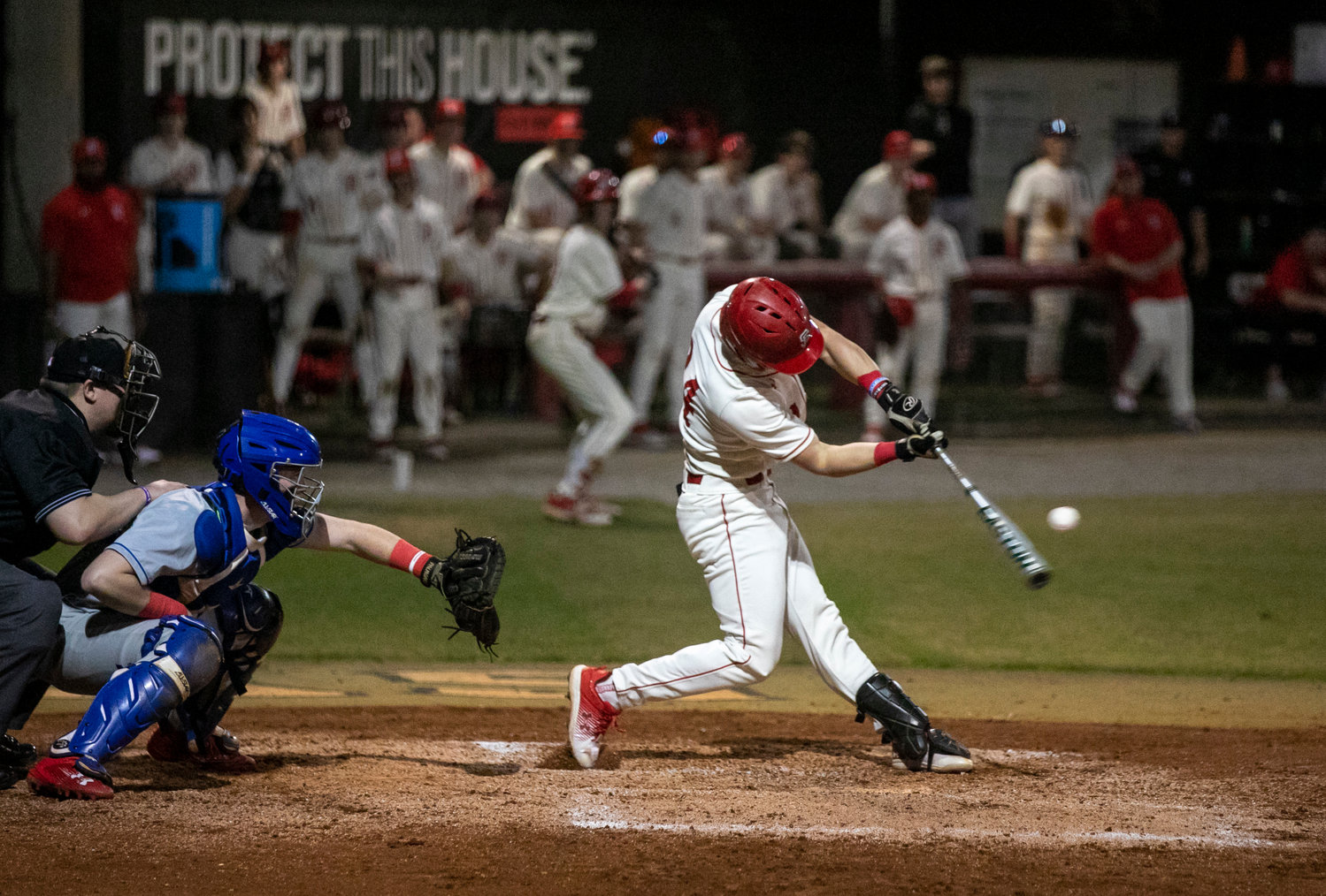 Spanish Fort’s Hayes Miller connects on a pitch during Opening Day festivities Thursday night at home. The Toros rallied for a 7-4 win to grab their first win in their first try.