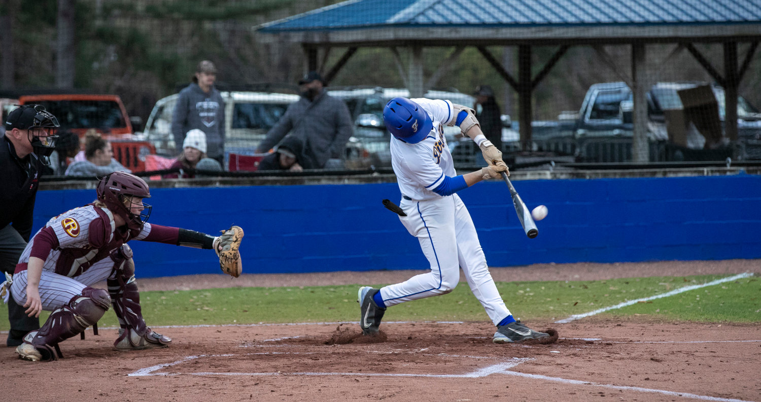 Fairhope senior Harrison Sparks connects on a grand-slam swing in the first inning of the Pirates’ non-area game against Robertsdale at home Friday night, Feb. 17. Sparks helped Fairhope score six runs in the first inning en route to a 10-1, Opening Day win.