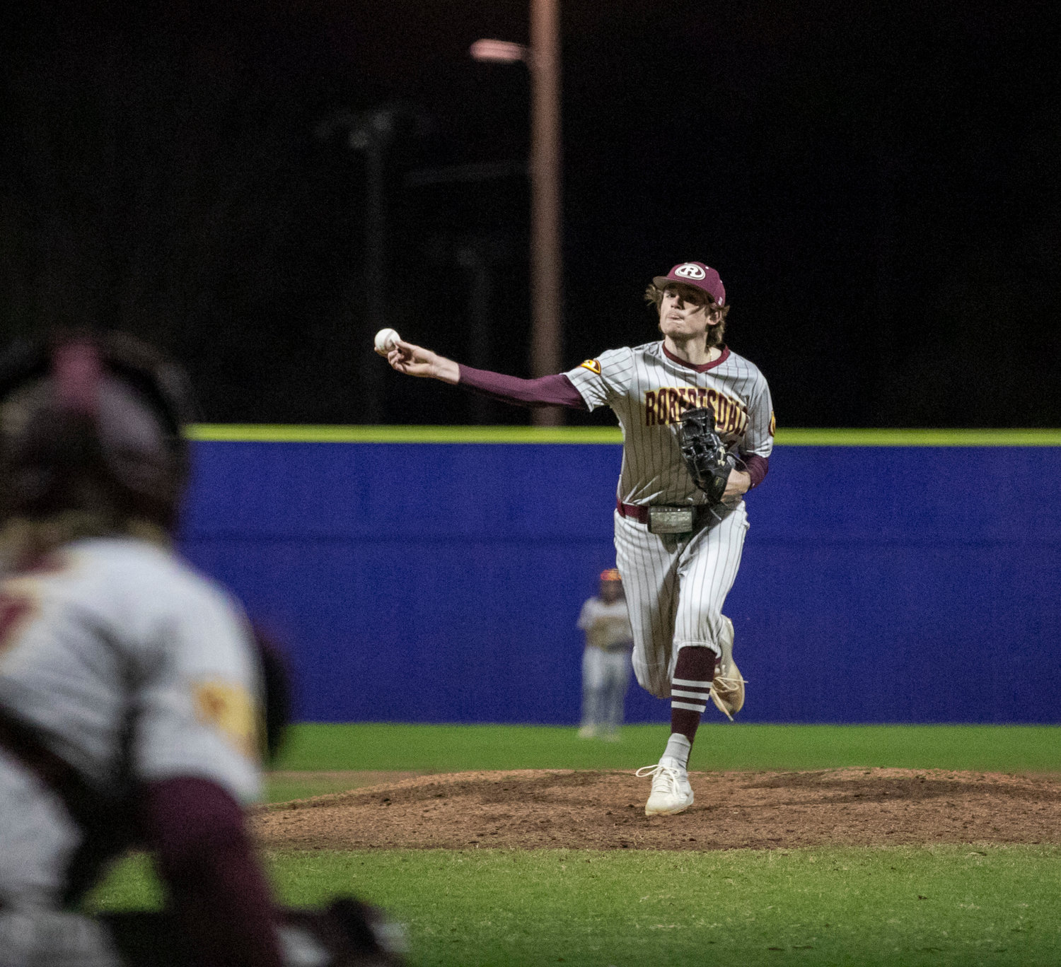 Robertsdale senior Dane Wigstrom fires a throw during the fourth inning of Friday’s non-area contest between the Golden Bears and Fairhope Pirates at Volanta Sports Park.