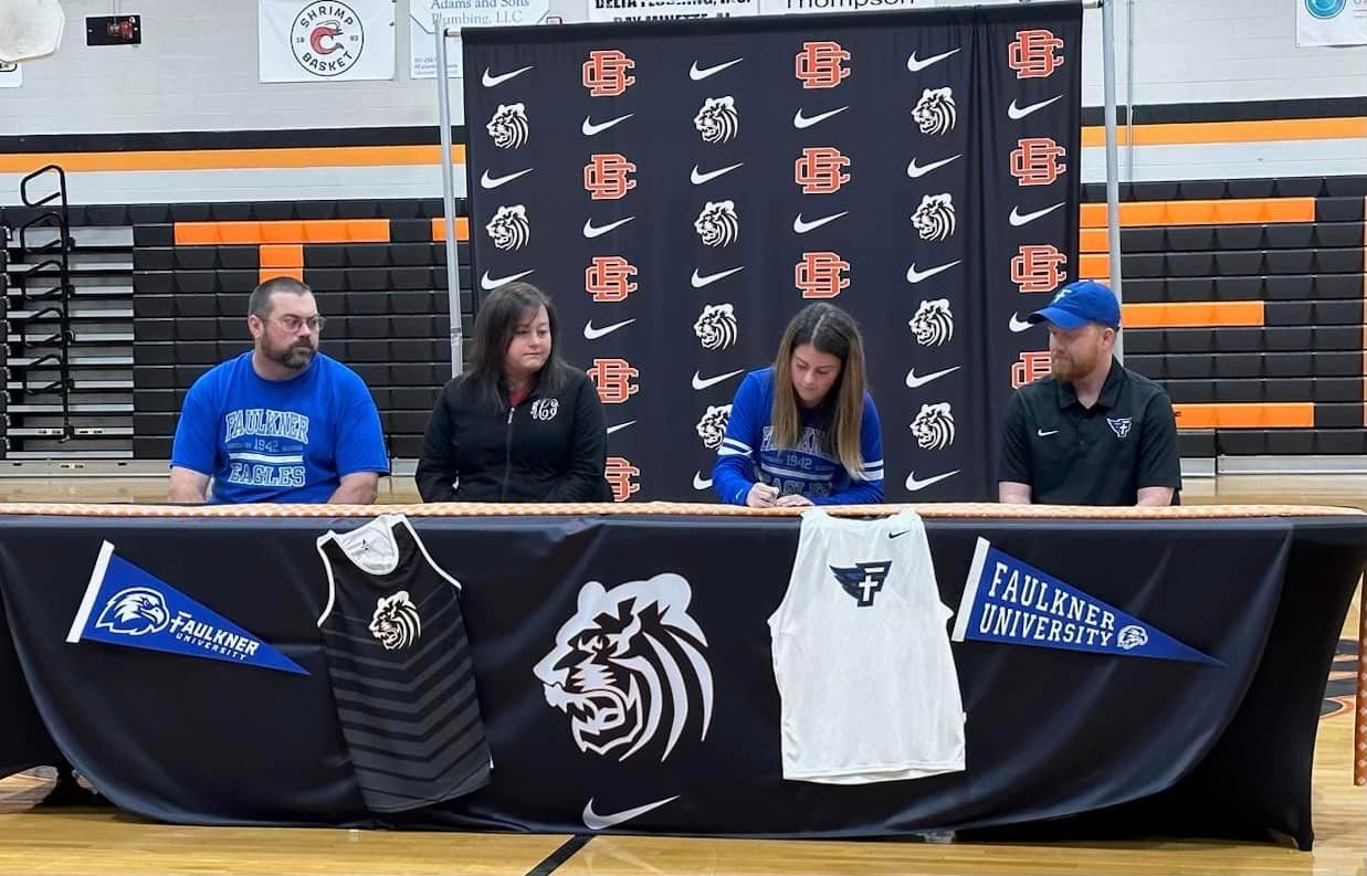 Baldwin County senior Kailee Cox puts pen to paper on her National Letter of Intent to join the Faulkner University cross country team after her time with the Tigers. A four-time state qualifier, Cox has also played four years of varsity soccer at Baldwin County High School.