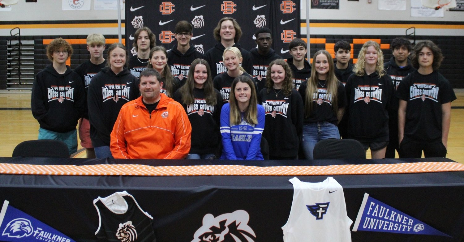 Cross Country runners celebrated Kailee Cox’s signing with the Faulkner Eagles during a Feb. 28 ceremony at Baldwin County High School. Head coach Matt Beckett said Cox was the Tigers’ first female cross country runner to sign with a college team.