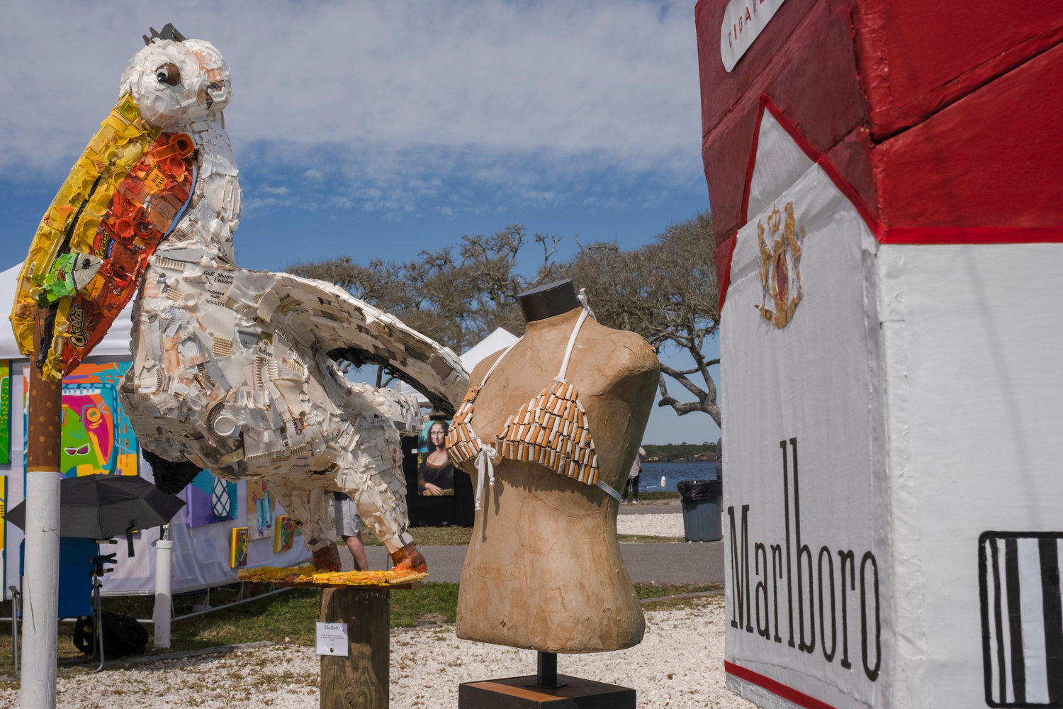 MICAH GREEN / GULF COAST MEDIA

JD Swiger and Swiger Studio’s sculptures made from recycled, found and collected material at his booth at Ballyhoo Festival at Gulf State Park on Saturday.