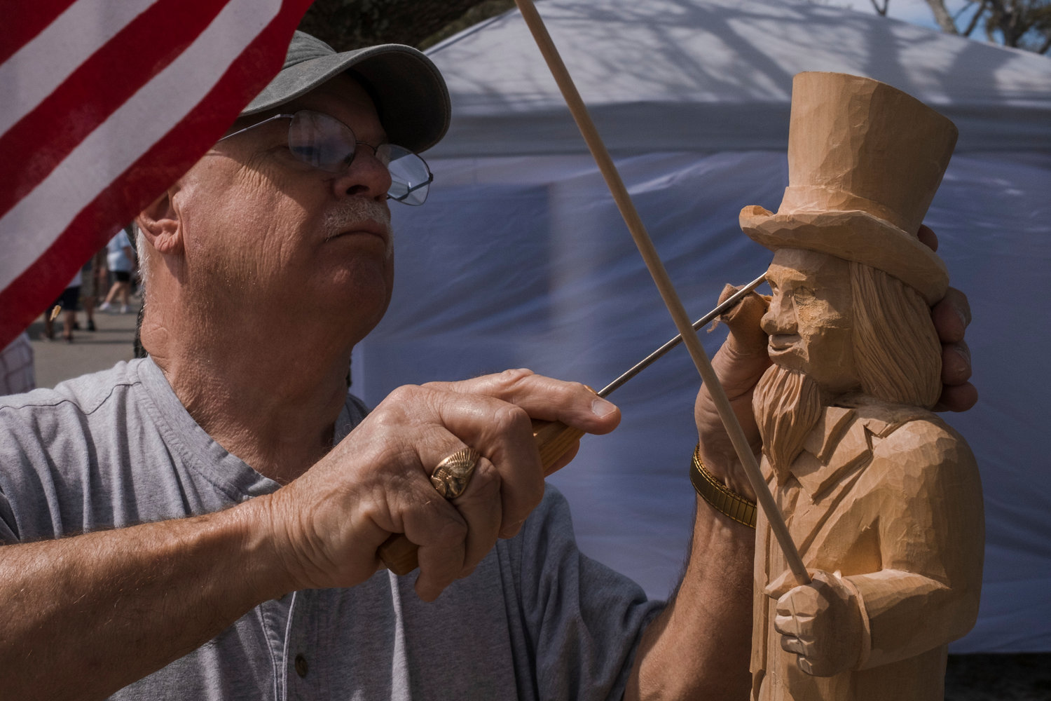 MICAH GREEN / GULF COAST MEDIA

Chip Smith, of Fairhope, works on a wood carving during Ballyhoo Festival at Gulf State Park on Saturday.