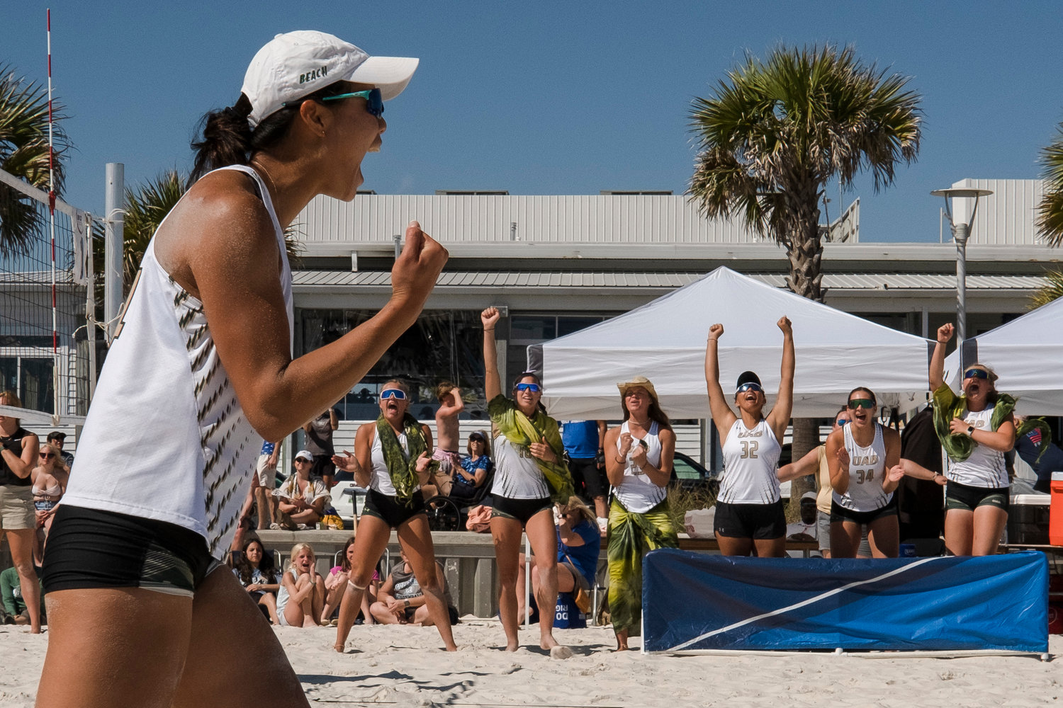 The UAB Blazers celebrate a point during the March to May tournament March 20, 2022, at the Gulf Place Beach in Gulf Shores. This weekend, they’ll play host to the fifth annual spring break tournament featuring half of the top-10 teams in the nation.