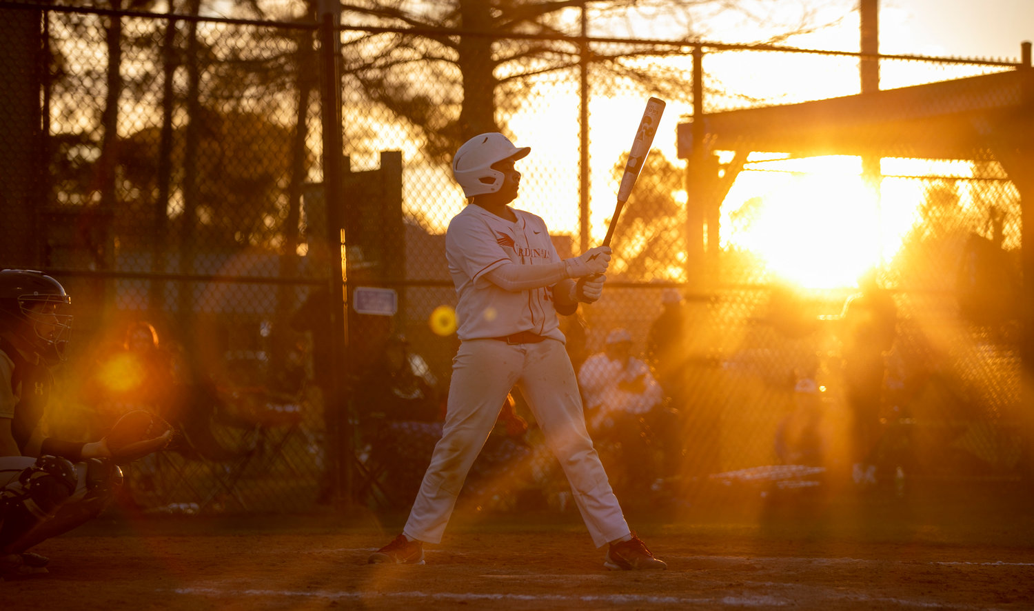 St. Michael freshman Noah Mosley prepares for an at-bat during the Cardinals’ Gulf Coast Classic game against Tennessee’s Giles County Bobcats at Johnnie Simms Park in Gulf Shores Wednesday, March 15. The golden-hour contest wrapped up St. Michael’s action in the first of three weeks’ worth of tournaments hosted in Baldwin County.