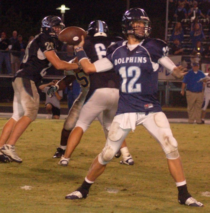 Gulf Shores quarterback Brandon Silvers loads a throw during the Dolphins’ non-region game against the Piedmont Bulldogs at home Oct. 7, 2010. Silvers finished this game with 261 yards and six touchdown passes including the game-winning, two-point conversion to lift Gulf Shores 43-42 in overtime.