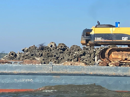 Reefballs that were removed from the south end of Mobile Bay are headed to the Dog River Reef.