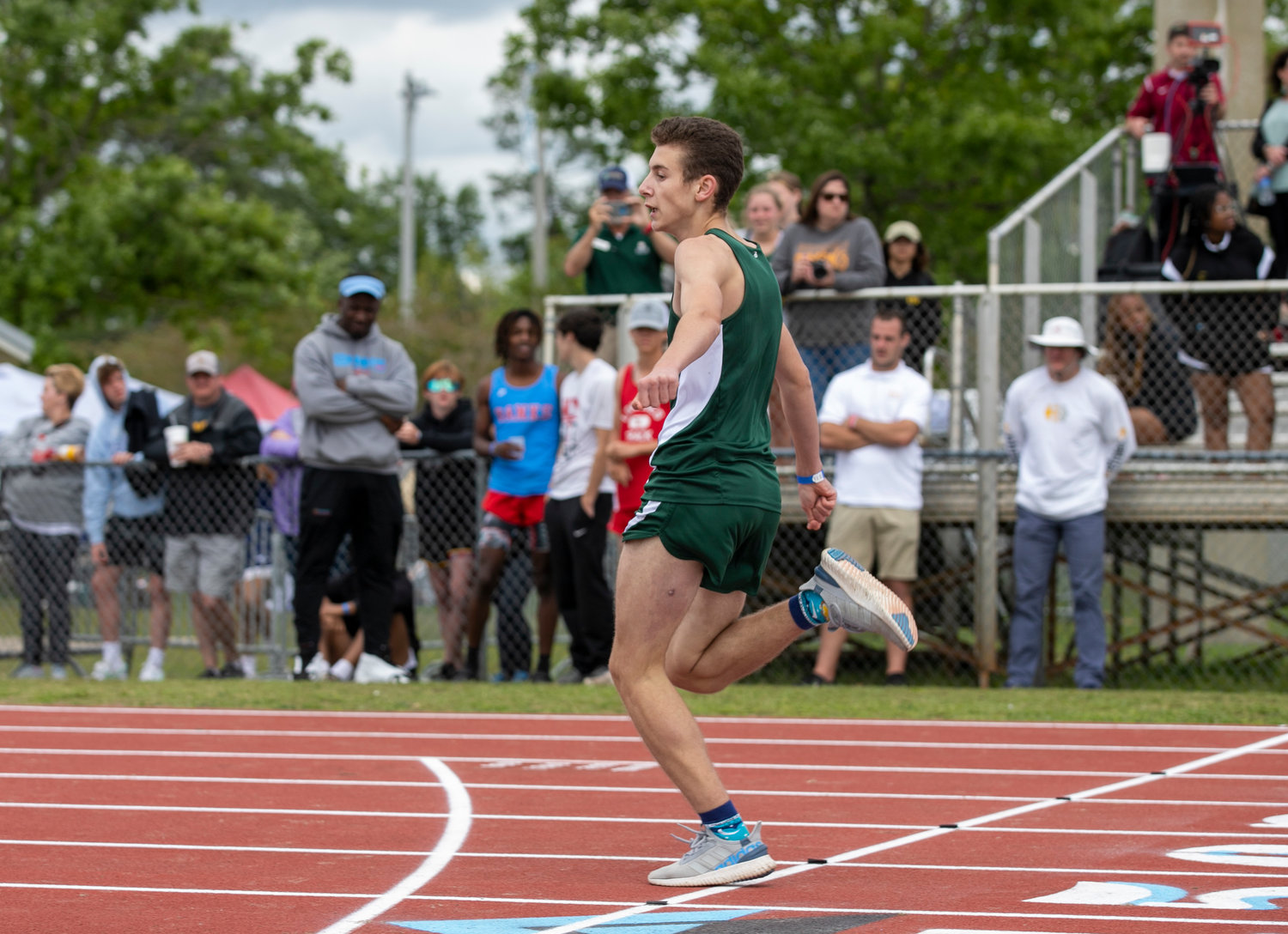 Snook Christian Academy junior Anton Mazur hits the finish line in first place of his section of the 400-meter dash on the first day of competition at the Alabama Independent School Association’s state track and field championships in Gulf Shores Thursday afternoon.