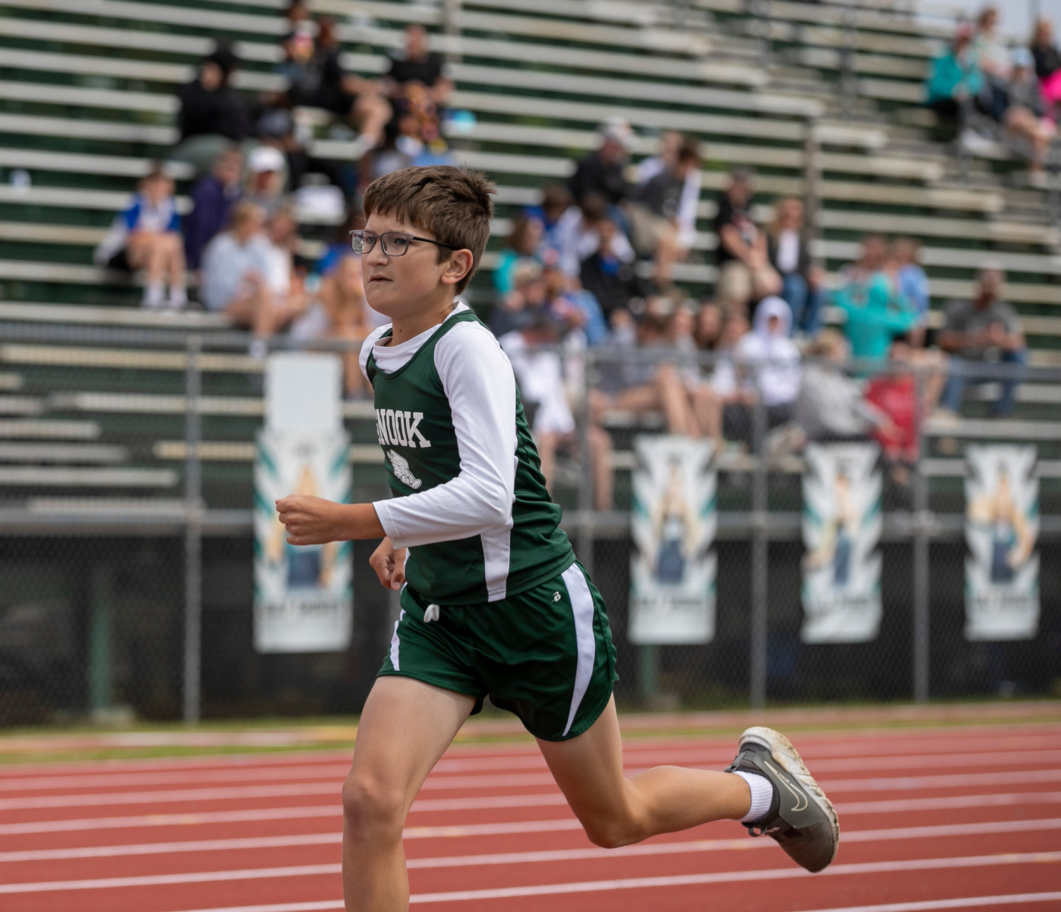 Jackson Yos eyes the finish line at the end of his 400-meter dash race at Gulf Shores’ Mickey Miller Blackwell Stadium during the opening day of the Alabama Independent School Association’s state track and field championships Thursday, April 14.