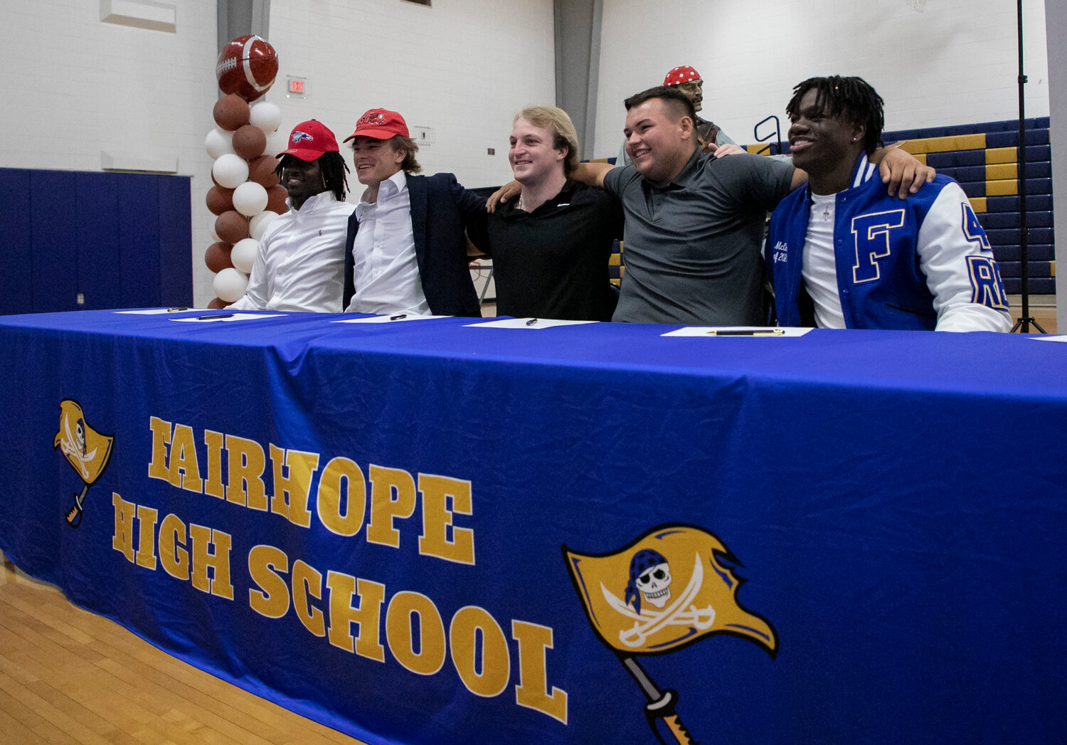 The next generation of Fairhope alumni playing college football will include Lashavion Brown, Caden Creel, Cory Devole, Mickey Herrick and Qualin McCants. The quintet was recognized among 17 student-athletes who signed National Letters of Intent Monday, April 17, at the high school.