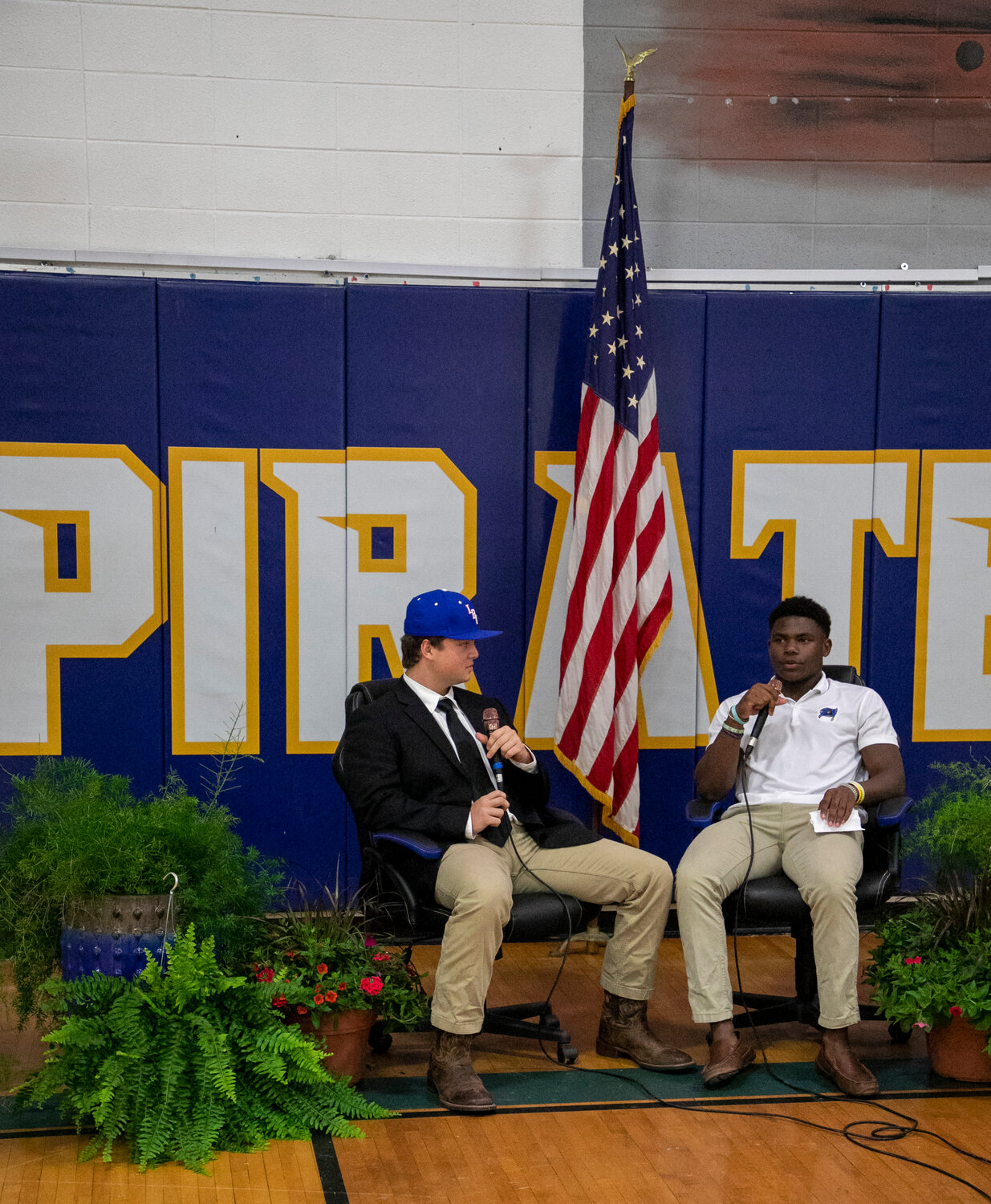 Jackson Hatcher signed with the Lurleen B. Wallace Saints baseball squad Monday, April 17, at Fairhope High School then hopped on Pirate Nation Live where he was interviewed by junior Preston Godfrey. Hatcher was among 17 Fairhope seniors who signed National Letters of Intent during the ceremony.