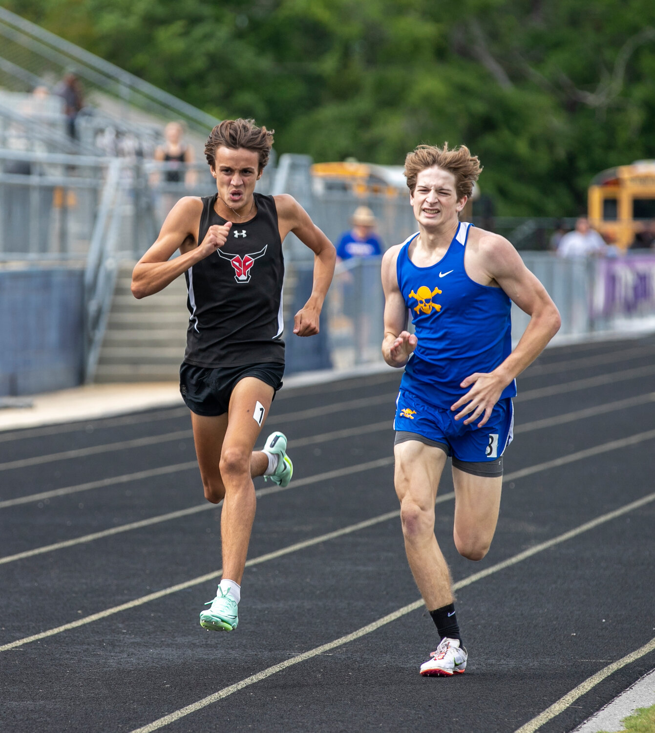 Spanish Fort junior Winston McGhee looks to overtake Fairhope sophomore Will Garner in the homestretch of the 800-meter run at the Baldwin County track and field championships Tuesday afternoon at Jubilee Stadium. McGhee’s time of 1:58.73 edged Garner’s time of 1:58.87 for first place.