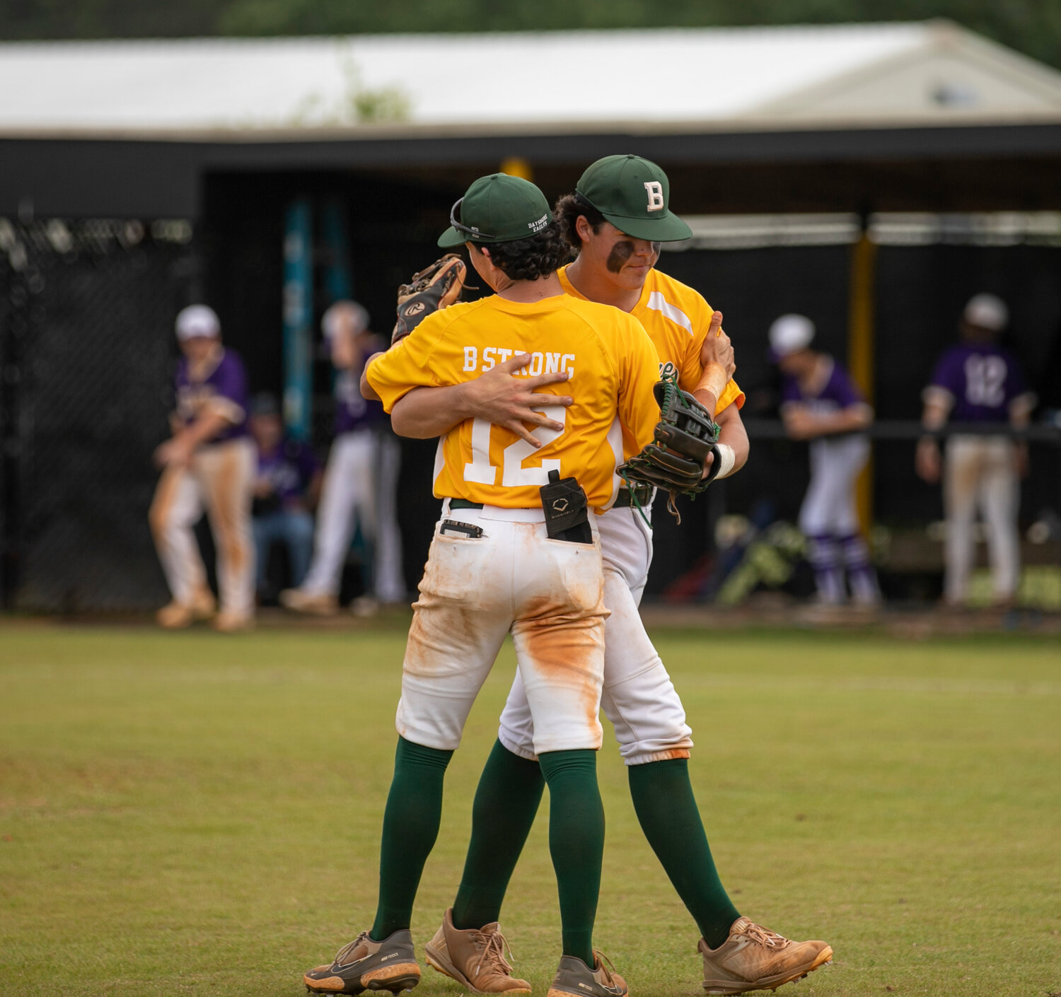 Eagle senior Streed Crooms embraces younger brother Nate after the latter completed a combined no-hitter to send Bayshore Christian to the second round of the AHSAA Class 2A state playoffs after a sweep of the Ranburne Bulldogs Friday, April 21, in Daphne. Friday’s pair of wins pushed a winning streak for the Eagles to 12 games where they hadn’t lost since March 21.