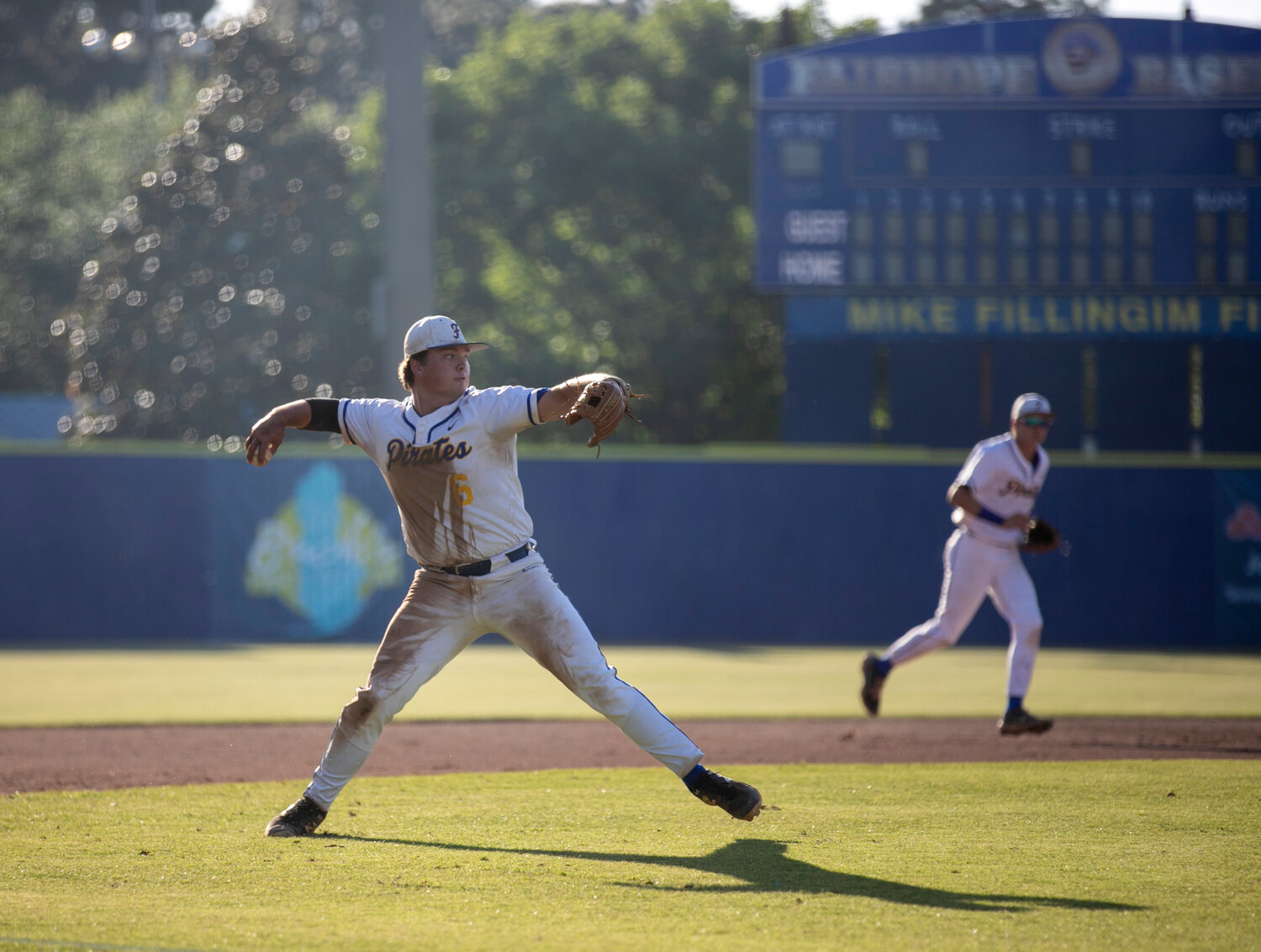 Fairhope senior Jackson Hatcher readies a throw across the diamond for an out Friday, April 28, on Mike Fillingim Field at Volanta Park during the first-round playoff series against the Smiths Station Panthers.