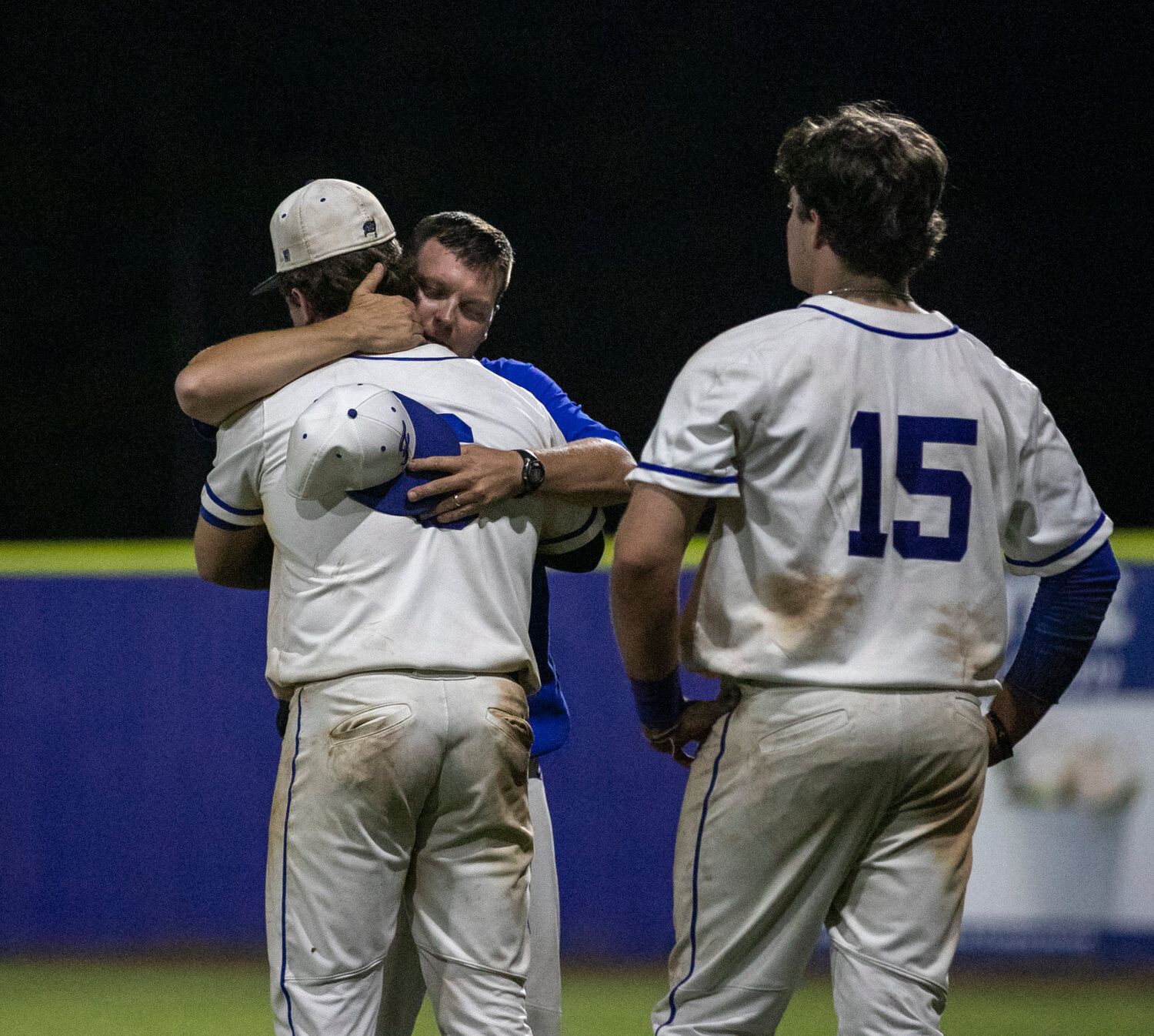 Pirate skipper Kyle Hunter embraces Jackson Hatcher after Fairhope’s season came to an end in the first round of the state playoffs against Smiths Station at home Friday, April 28.