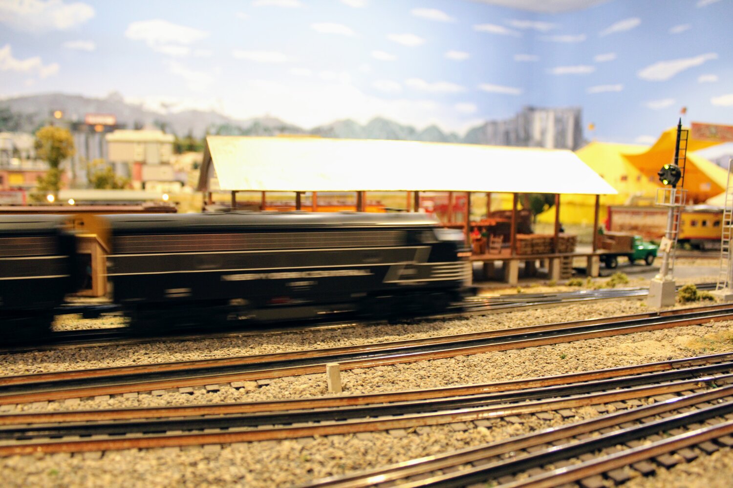The train blasts past the L. Irwin & Sons Southland Potatoes’ shed.