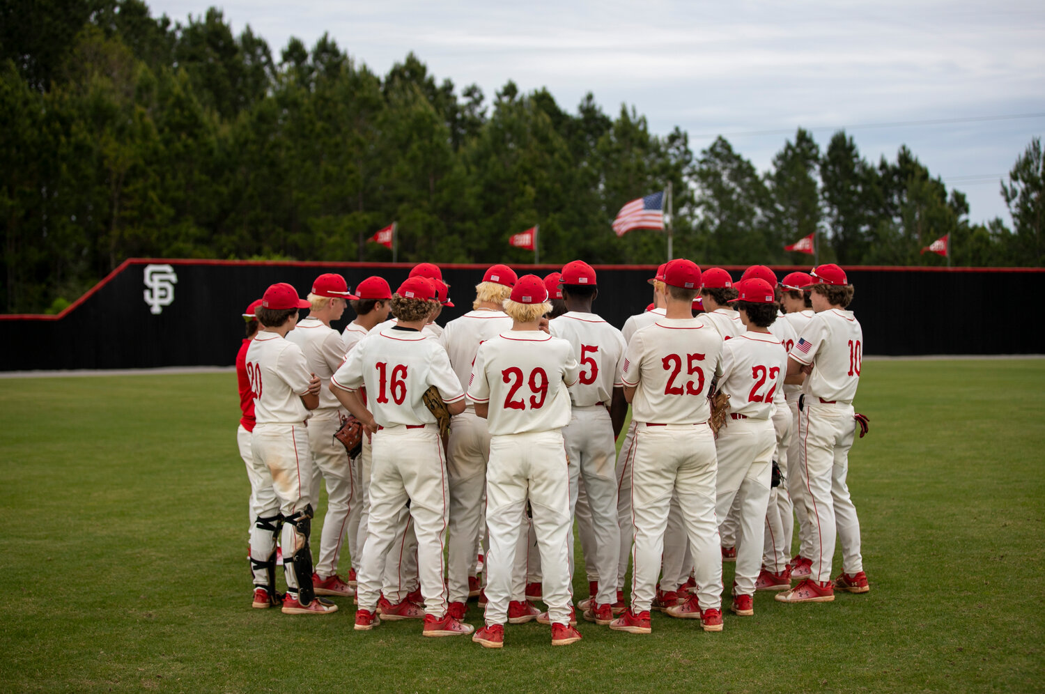 The Spanish Fort Toros gather in the outfield before their Class 6A first-round playoff series against the McAdory Yellowjackets April 21 at home. Wednesday at Jacksonville State served as the end of the road as Spanish Fort was swept by Oxford in the AHSAA state championship series in the Toros’ first title appearance since 2014.