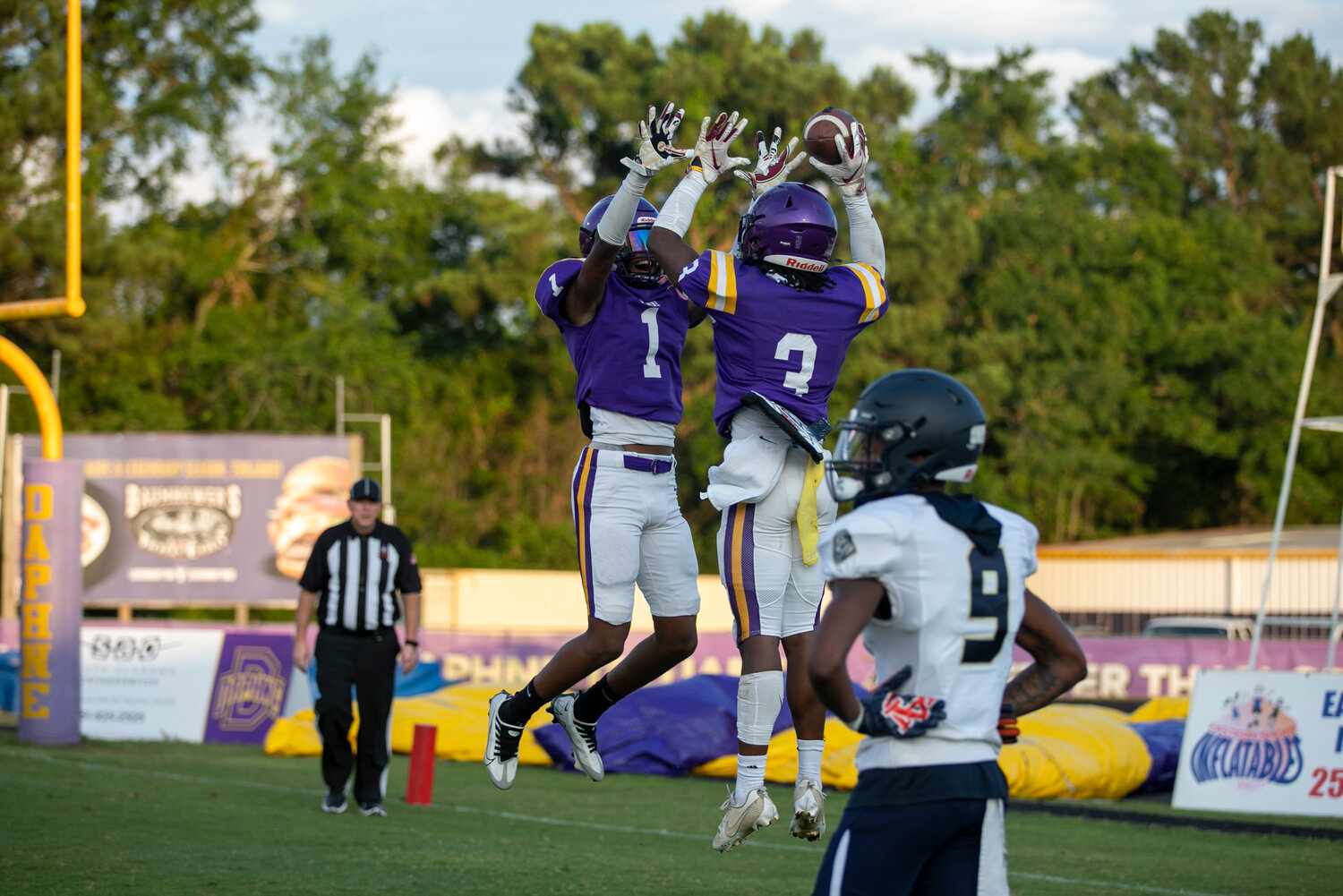 Daphne rising junior RJ Dailey (3) celebrates his second touchdown of the night that helped the Trojans beat Foley 21-17 in the spring exhibition game Friday night at Jubilee Stadium.