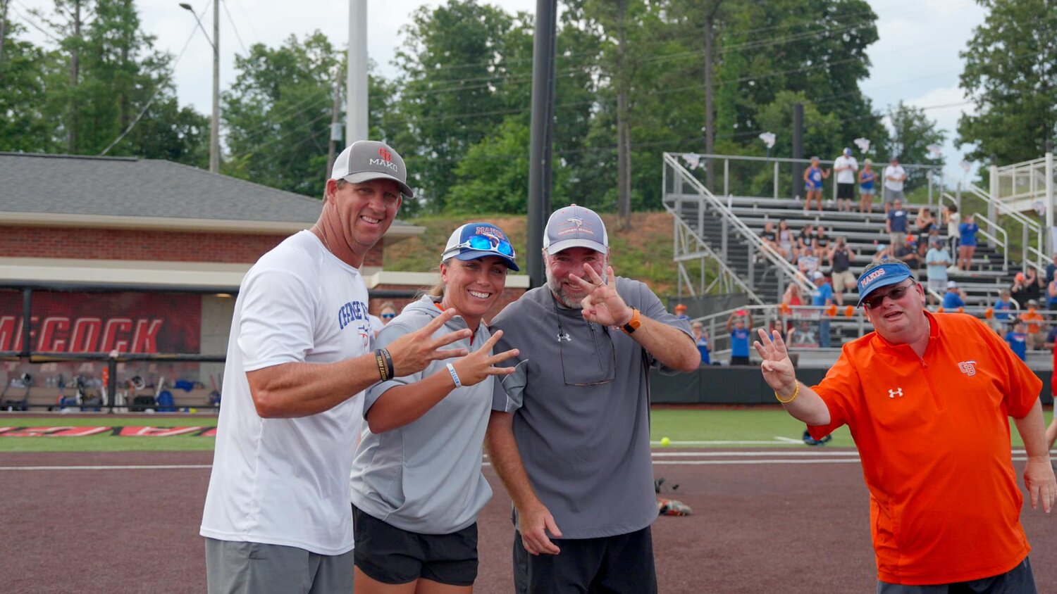 The Orange Beach Mako softball coaching staff celebrates a third consecutive state championship Saturday afternoon in Jacksonville after a 5-0 win over Houston Academy in the Class 4A finals. Orange Beach finished its first 4A state tournament undefeated with run-rule wins over White Plains and Prattville Christian and two wins over the Raiders from Houston Academy.