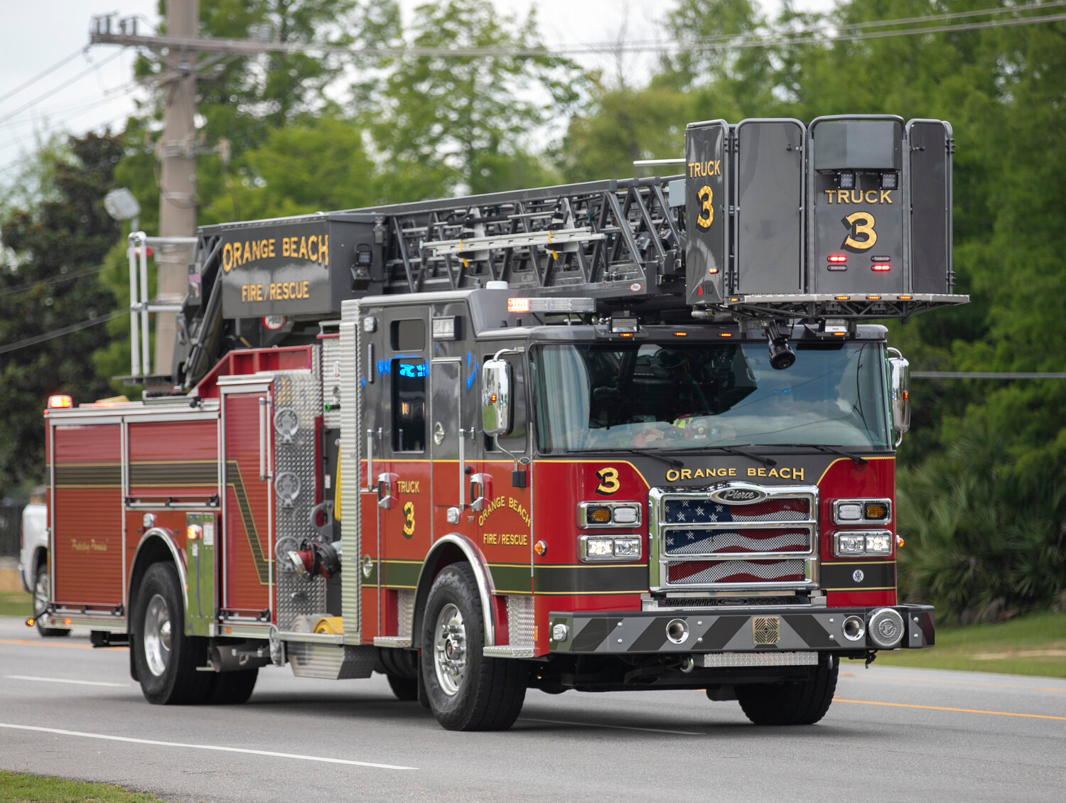 Orange Beach first responders provided an escort for the Mako softball team back to the high school on their return trip from the AHSAA state tournament in Oxford Sunday, May 21. The fire engine that led the way for the three-time state champions was none other than the #3.