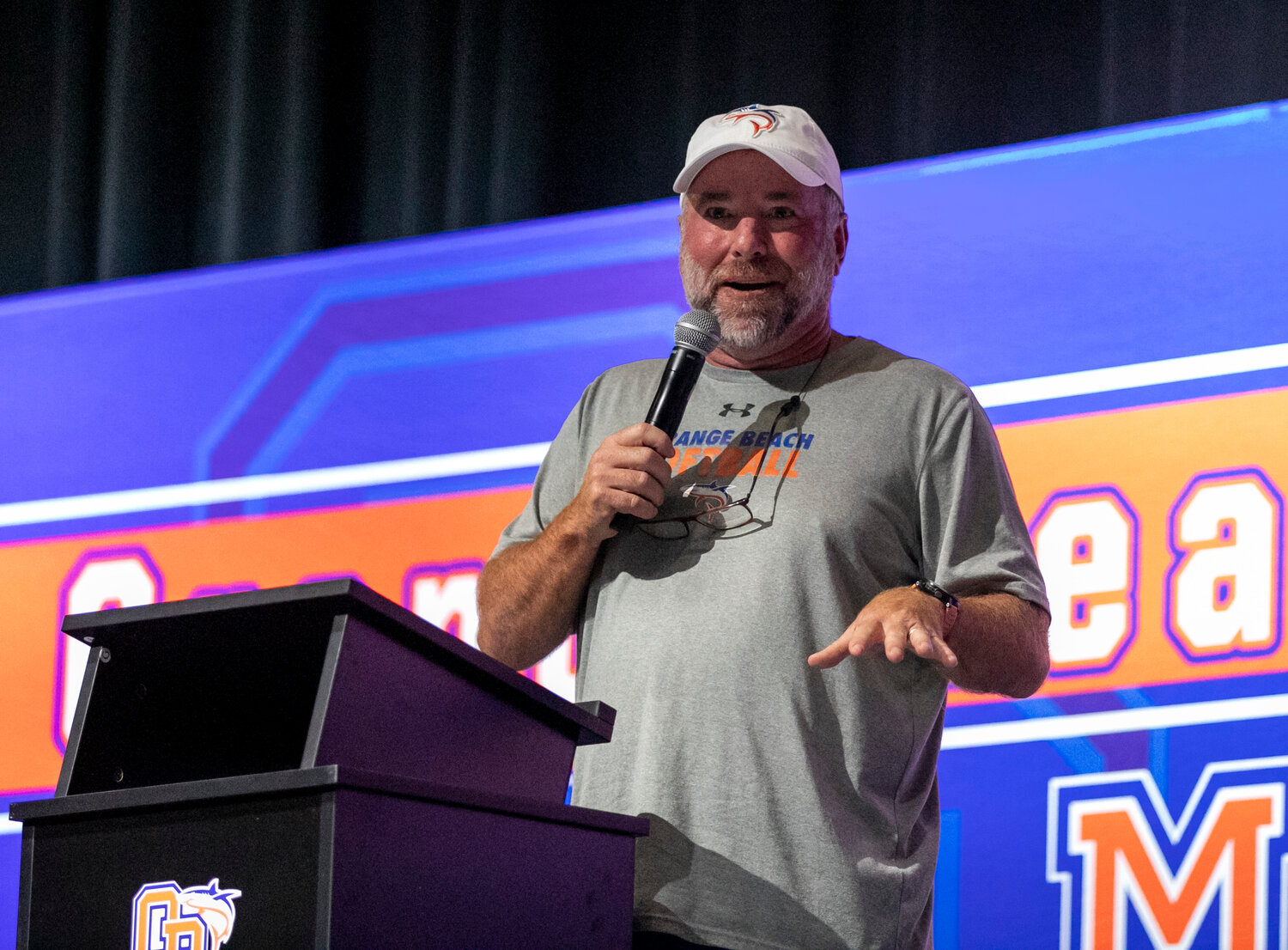 Mako head softball coach Shane Alexander delivers remarks on the 2023 season during the welcoming ceremony Sunday afternoon recognizing Orange Beach’s AHSAA state title on the Class 4A circuit.