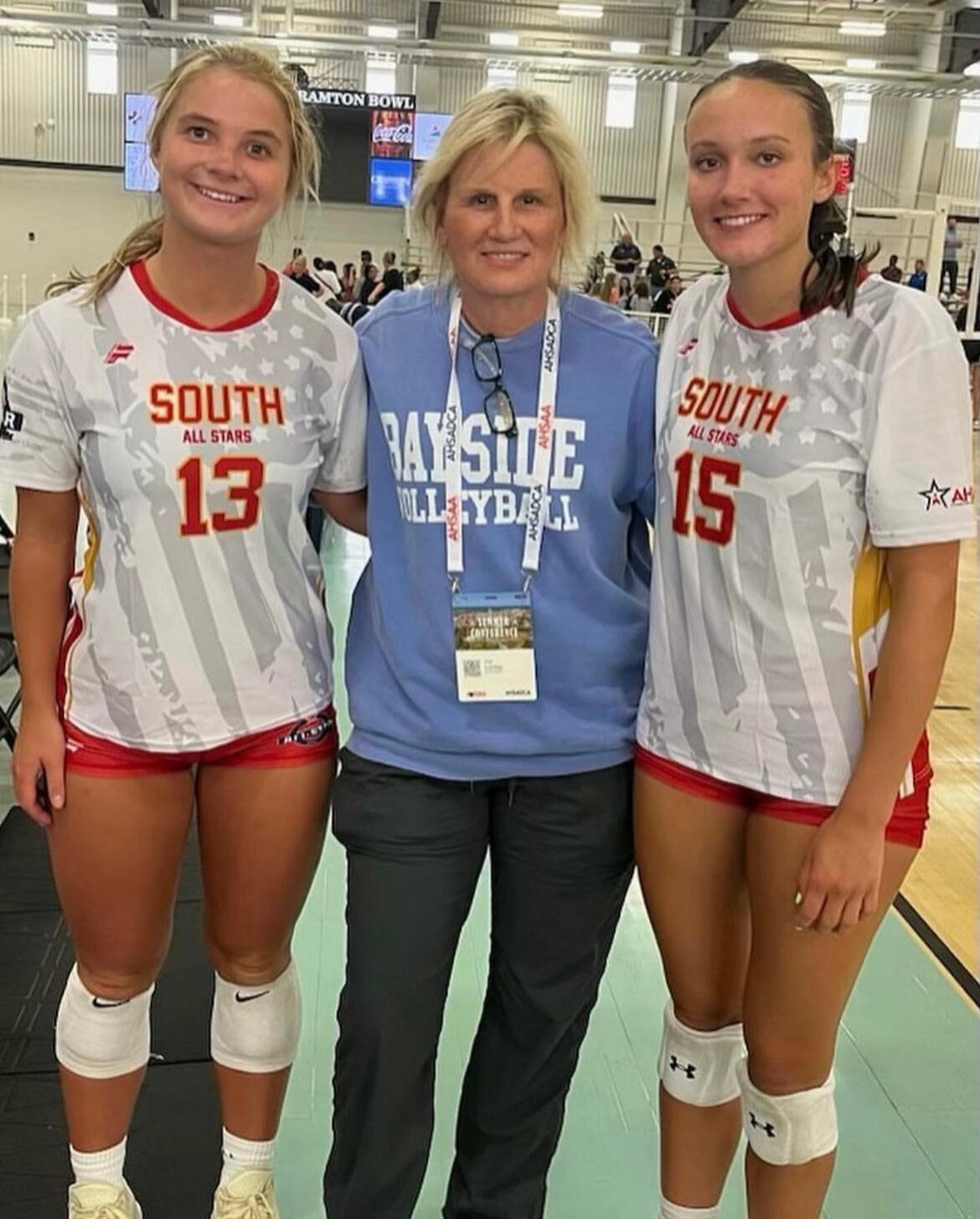 Bayside Academy head volleyball coach Ann Schilling joined her All-Star Admirals, Maysie Douglas (13) and Blakeley Robbins (15) after the North-South classic in Montgomery on Thursday, July 20. The pair of athletes helped the South score a 3-1 win.