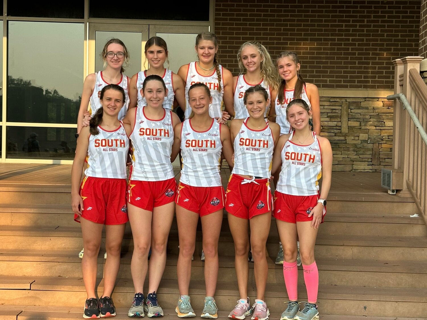 The South All-Star girls’ cross country squad poses for a team picture before the races on Tuesday, July 18, as part of the annual AHSAA North-South All-Star Week in Montgomery. Baldwin County was represented by Daphne’s Sophie West (first on the right in back row) and Spanish Fort’s Alexiana Hinote (second on the right in front row) who both recorded top-15 finishes.