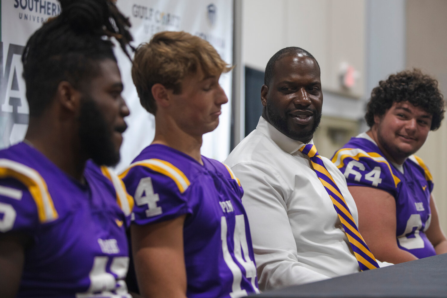 The Daphne Trojans ponder a question posed at the second-annual Gulf Coast Media Day at the Orange Beach Event Center on July 27 where teams previewed their upcoming seasons and also shared their takes on certain pressing food topics.