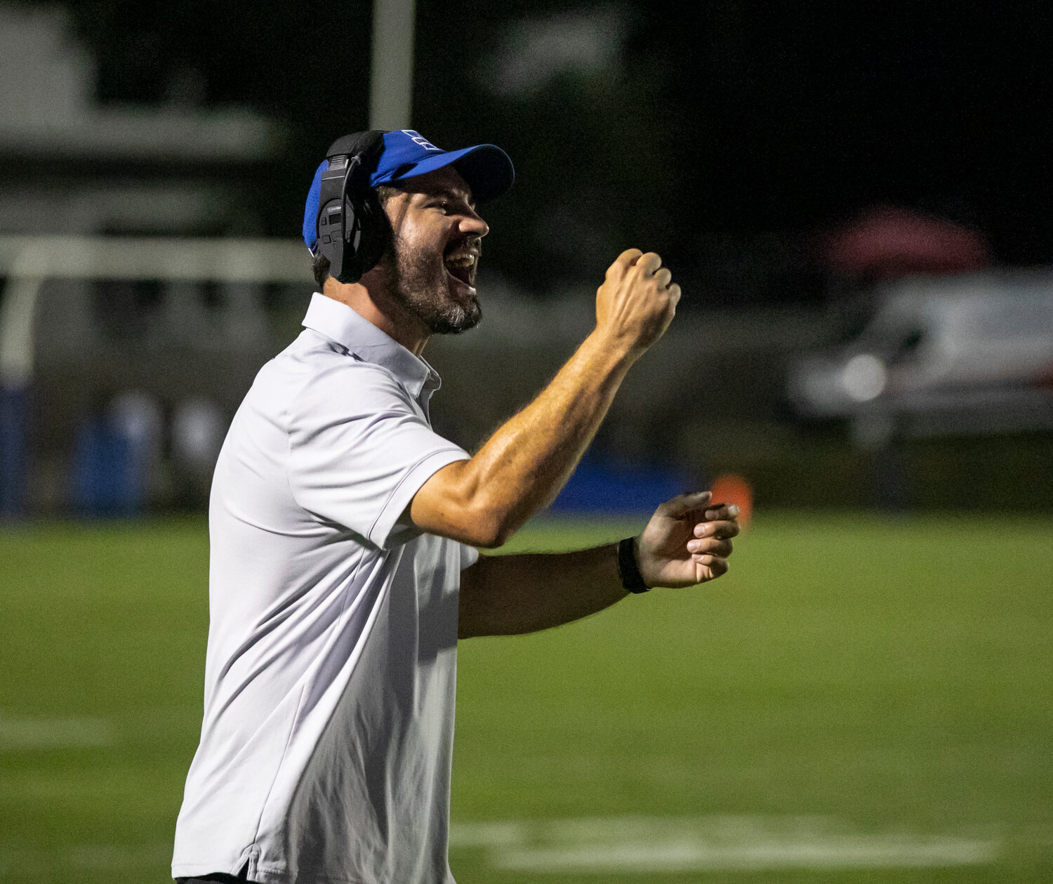 Bayside Academy head coach Barrett Trotter celebrates an Admiral touchdown Friday night at Freedom Field in Daphne as part of Bayside Academy’s first regular-season game. Trotter notched his first win as the Admirals’ head man by a 33-7 score over Elberta.