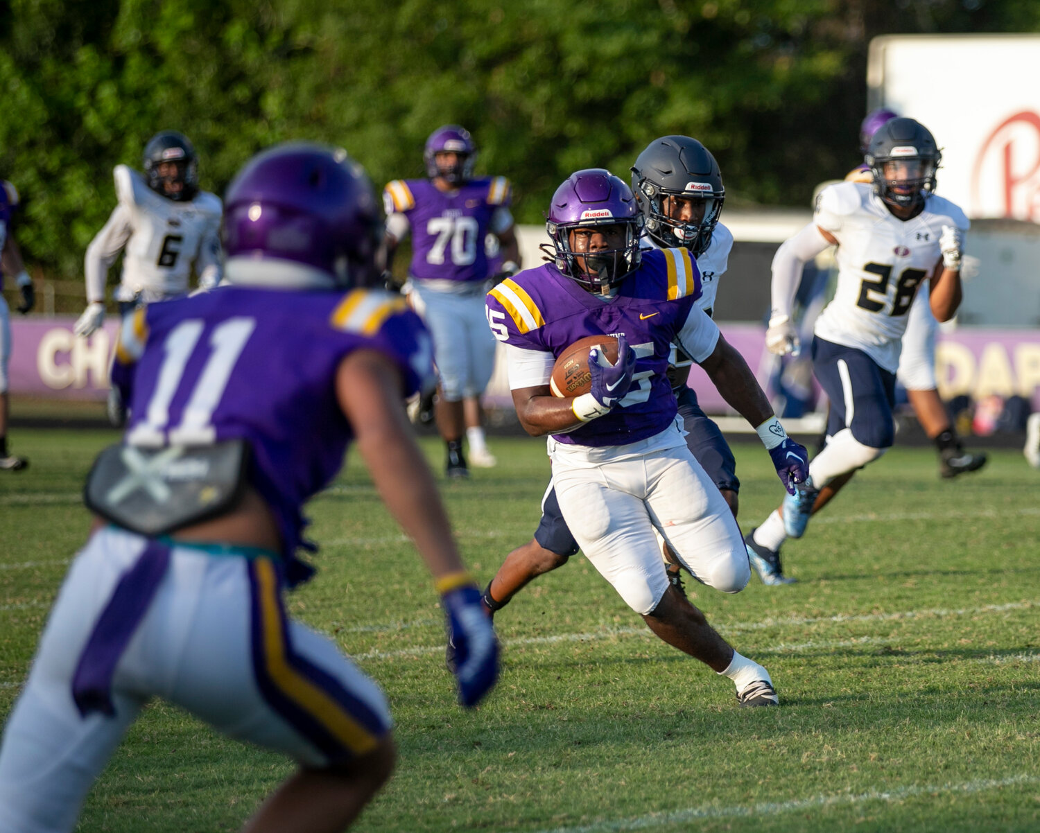 Daphne senior Nick Clark makes a cut to the outside on a first-down run during the Trojans’ spring game against the Foley Lions on May 19 at home. Clark paced the Daphne offense in Week 1 of the regular season with two touchdowns and 114 rushing yards on 21 carries to help the Trojans take down Murphy 19-0.