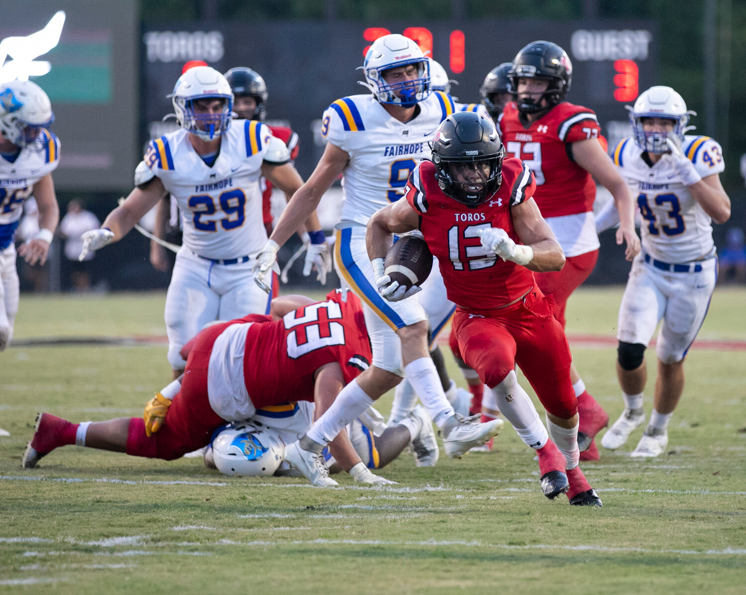 Spanish Fort junior Sawyer Wilson explodes into the second level of the defense on a carry during the Toros’ season-opening game against the Fairhope Pirates at home on Aug. 24. Wilson supplied two rushing touchdowns to Spanish Fort’s 44-0, region-opening win over Blount Friday night on The Hill.