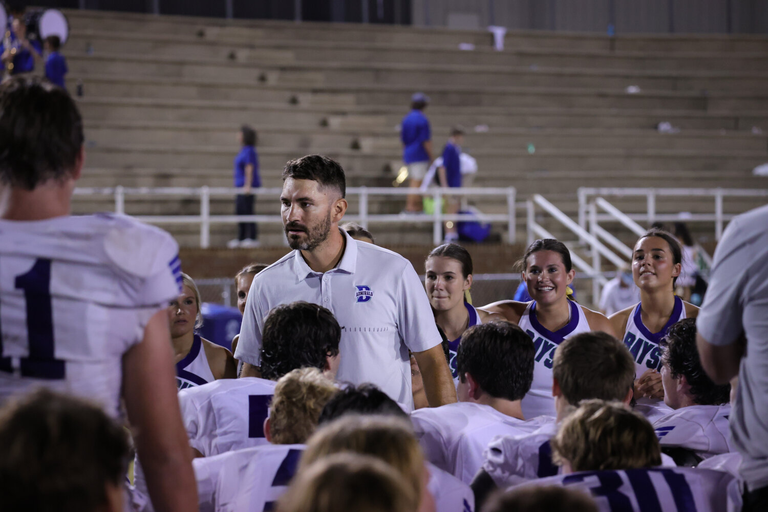 Bayside head football coach, Barrett Trotter, addressing his team post game at the W.C. Majors Field in Fairhope Sep. 7. Trotter told his team he is proud of them and that they don't quit.