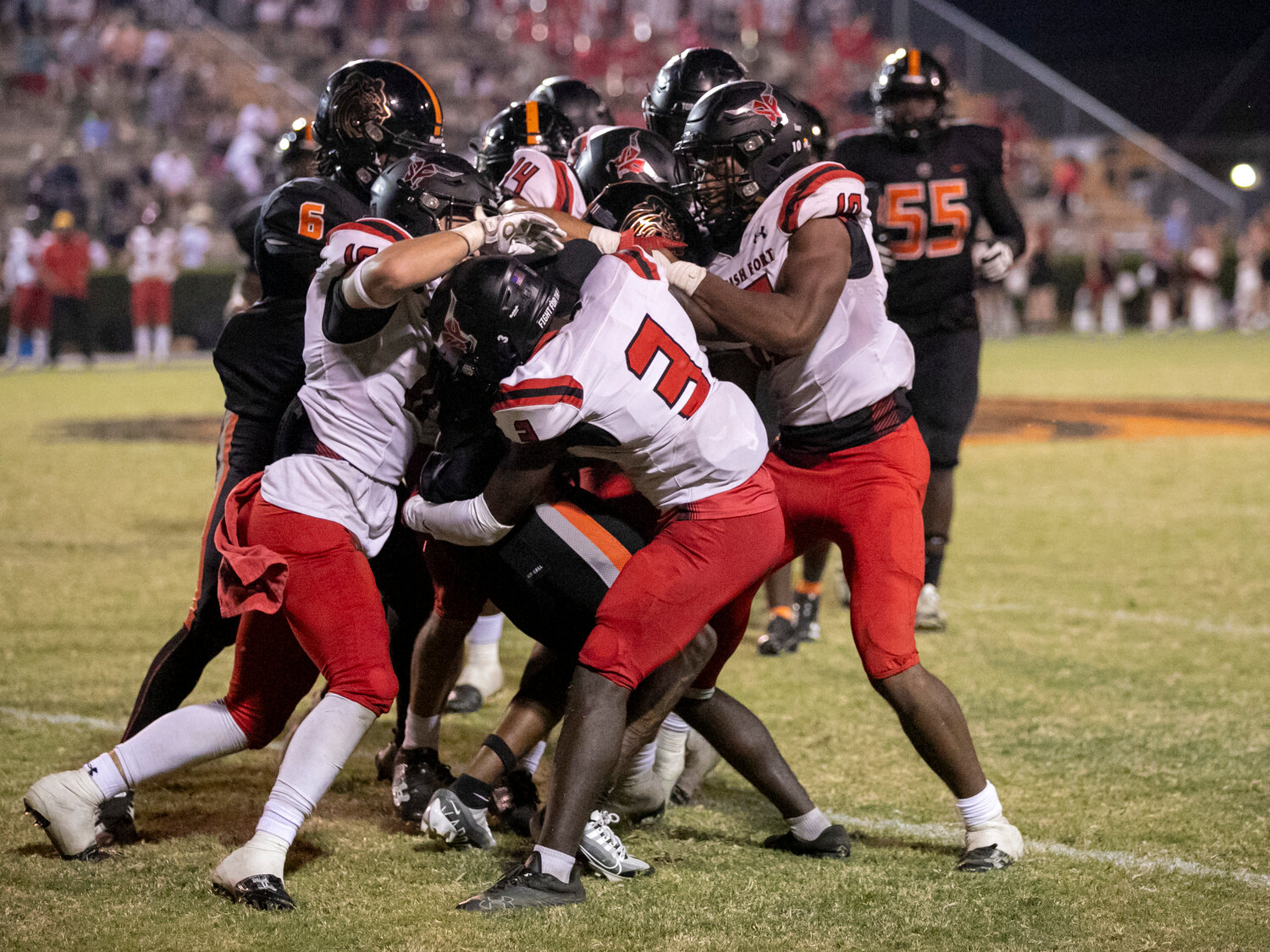 The Spanish Fort Toro defense, including Landon York (16), Markell Kyer (3), Drew Pannone (14) and Sterling Dixon (10), stand up a Baldwin County ballcarrier Friday night in Class 6A Region 1 action at Lyle Underwood Stadium in Bay Minette. Spanish Fort came up with two turnovers on downs in the final five minutes of regulation to preserve a 14-13 win over the Tigers.