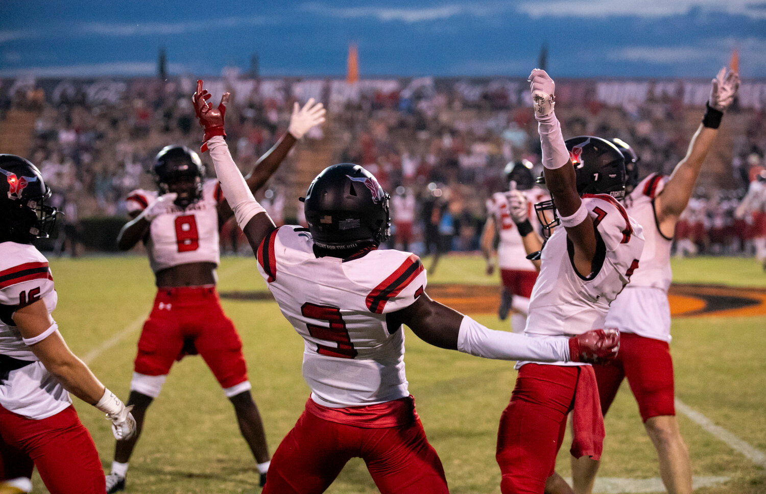 The Spanish Fort defense, including Landon York (16), Javonte Wilson (8) and Isaiah Spencer (7), celebrates Markell Kyer’s (3) first-half interception during the Toros’ region tilt against the Baldwin County Tigers at Lyle Underwood Stadium in Bay Minette on Friday, Sept. 8. The Spanish Fort defense staved off a second-half comeback to help earn a 14-13 win.