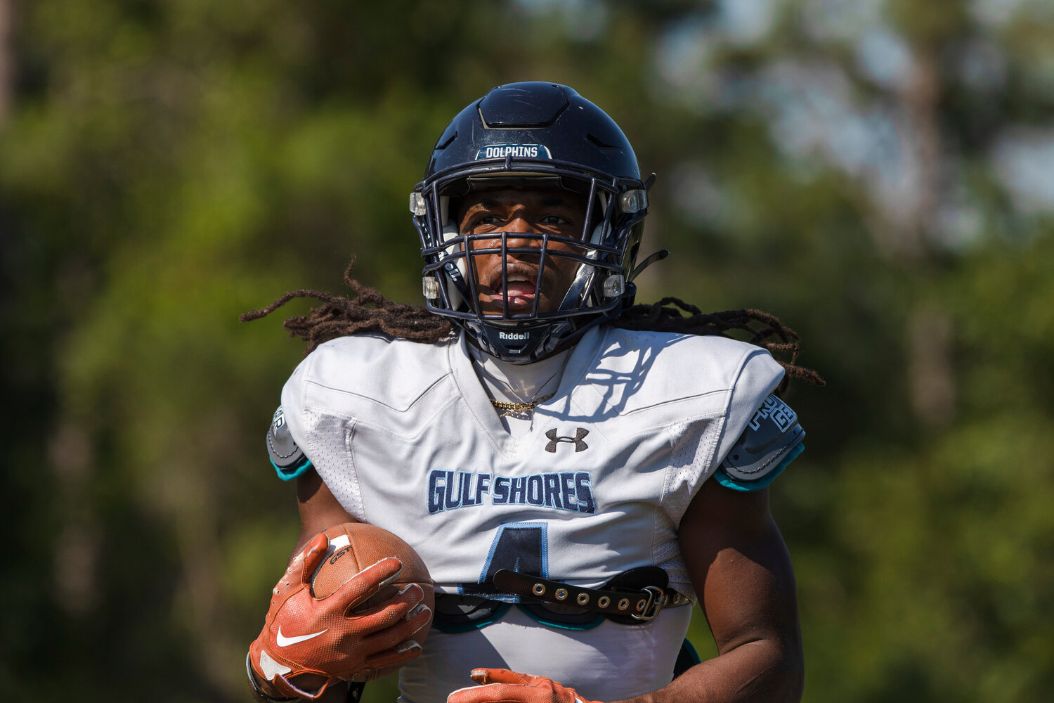 Gulf Shores senior Ronnie Royal works out during May 3’s spring practice at the high school. On Friday against Faith Academy, Royal ran for 100 yards and also recorded 4 tackles to help the Dolphins enact revenge on the Rams with a 31-16 win in Week 3.