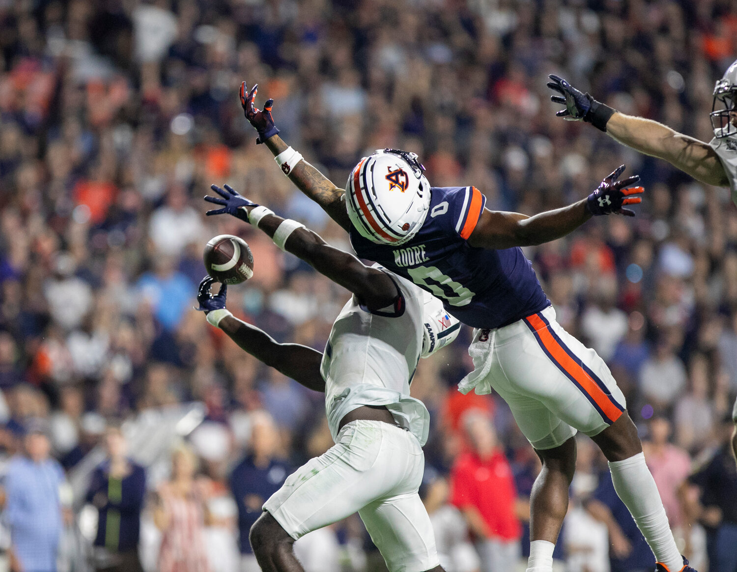 Samford junior Kourtlan Marsh comes down with an interception in the end zone during the Bulldogs’ game against the Auburn Tigers at Jordan-Hare Stadium Saturday night.