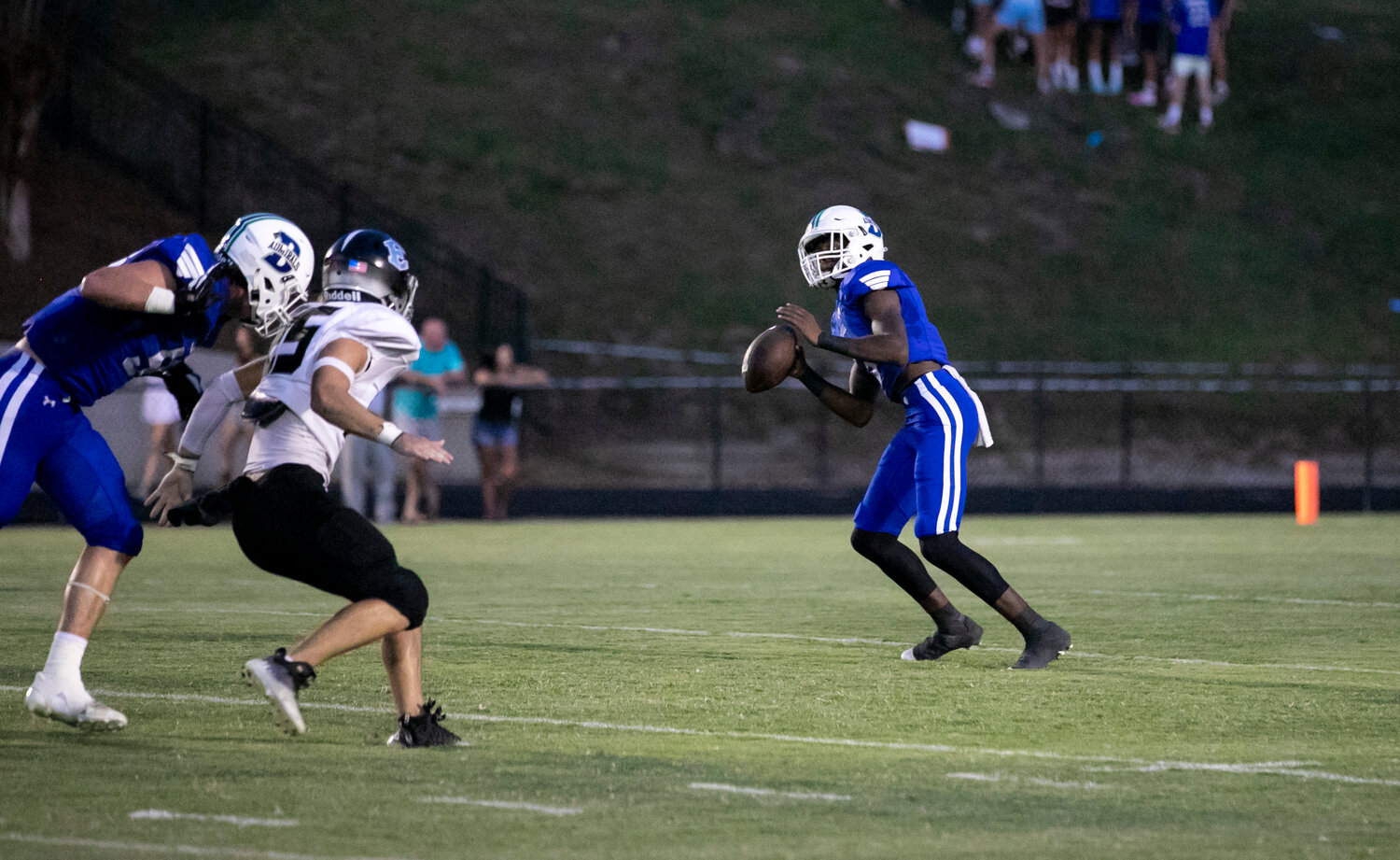 Bayside Academy sophomore Sammy Dunn loads up a throw during non-region action against the Elberta Warriors on Aug. 25 at home. Friday night against Wilcox Central, Dunn threw five touchdown passes to four different receivers to help move the Admirals to 4-0 for the second season in a row.