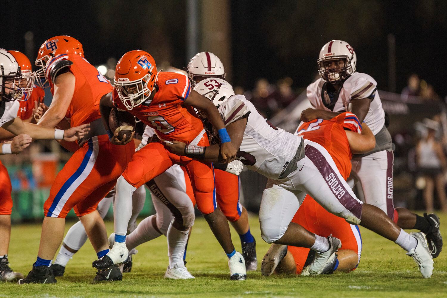 Orange Beach senior Shamar Lowe tries to shed a Satsuma tackler during the Makos’ home game against the Gators in Class 4A Region 1 action Friday night at the Orange Beach Sportsplex. Satsuma secured a 17-15 win and Orange Beach is set for an away game against the T.R. Miller Tigers in Week 5.