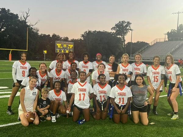 The Baldwin County Tigers celebrate their 35-12 win over the LeFlore Rattlers on Tuesday, Sept. 19, in Mobile. It was the inaugural flag football game for the program that is set to compete in Class 6A/7A Area 2 this fall.