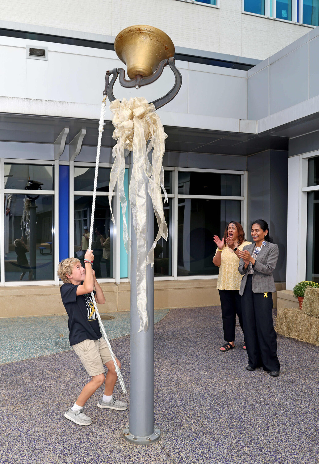 The day holds special meaning for many of the brave children, their parents and caregivers, as it often marks the beginning of a new chapter in their lives. This year's ceremony allowed each patient an opportunity to ring a large bronze bell in the hospital's courtyard as they reunited with those who cared for them.