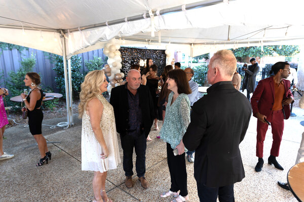 Owner of The Fairhope Inn, Page Dawson, chatting with guests who attended the premiere party of "Love In Fairhope" on Sept. 27.