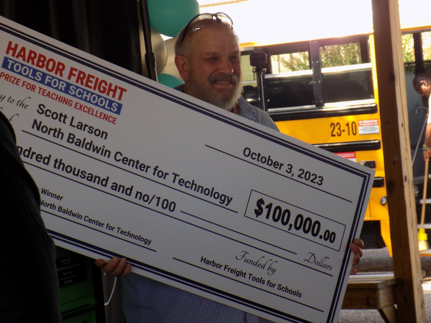Scott Larson, carpentry and construction teacher at North Baldwin Center for Technology, was surprised with a $100,000 check for his program on Oct. 3.