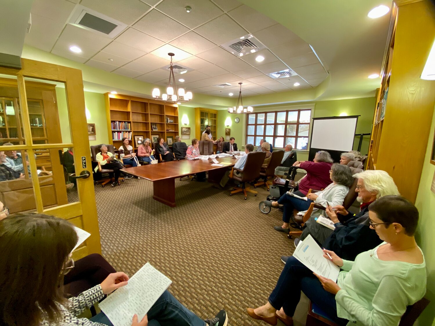 The second floor board library boardroom was at capacity for the October library board meeting.